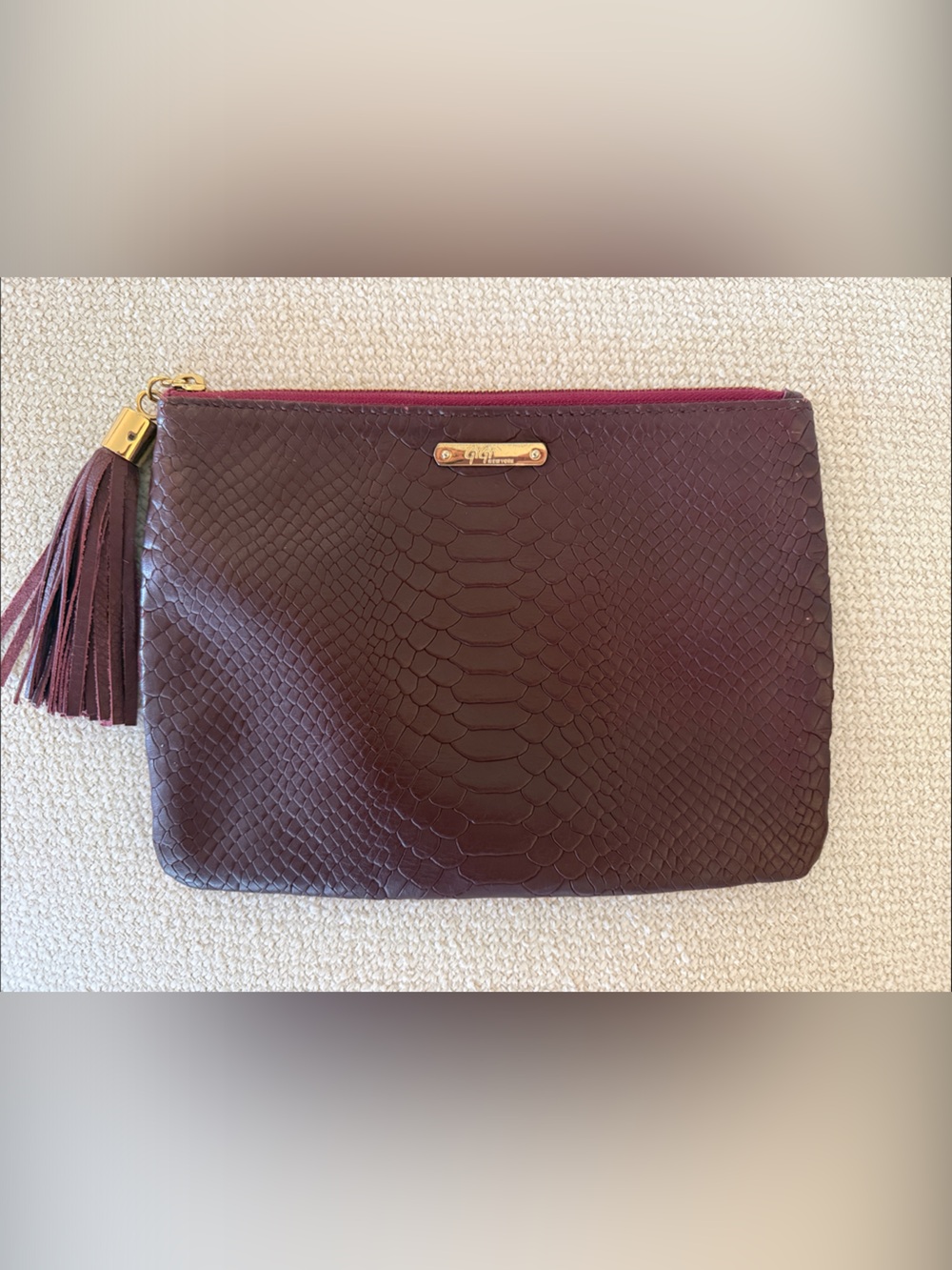 GiGi New York Wine Textured Tassel Zip Wristlet